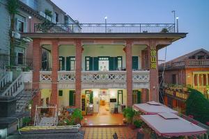 【预售/需二次确认】厦门鼓浪屿微热客栈八店通用票1晚