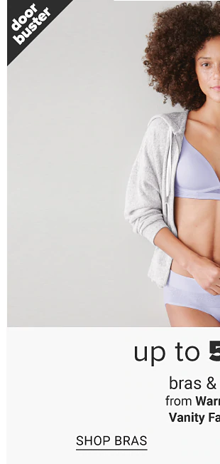 A woman in a light purple bra and panty set. Doorbuster, up to 50% off bras and panties from Bali, Vanity Fair, Playtex and more, shop bras, shop panties.