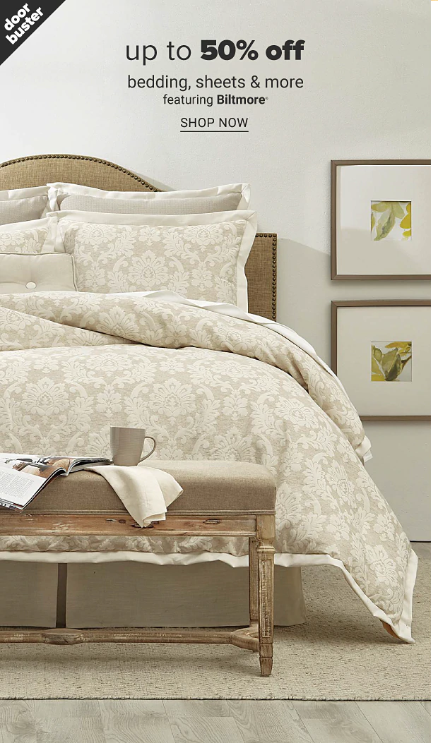 A bed with light beige bedding with a floral pattern and pillows to match. Doorbuster, up to 50% off bedding, sheets and more featuring Biltmore, shop now.